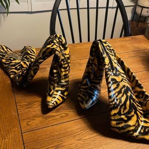 Size 8 thigh-high boots.